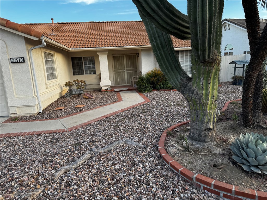 27519 Terrytown Road Menifee, CA 92586 - Photo 2 of 22 a view of a house with a porch