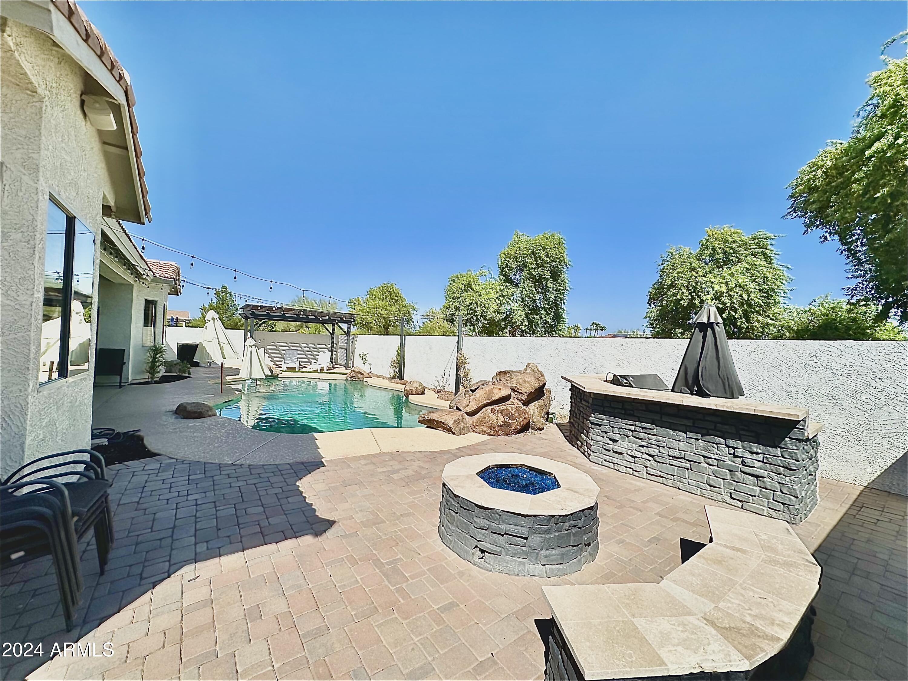 16852 West Northampton Road Surprise, AZ 85374 - Photo 21 of 31 Backyard Patio