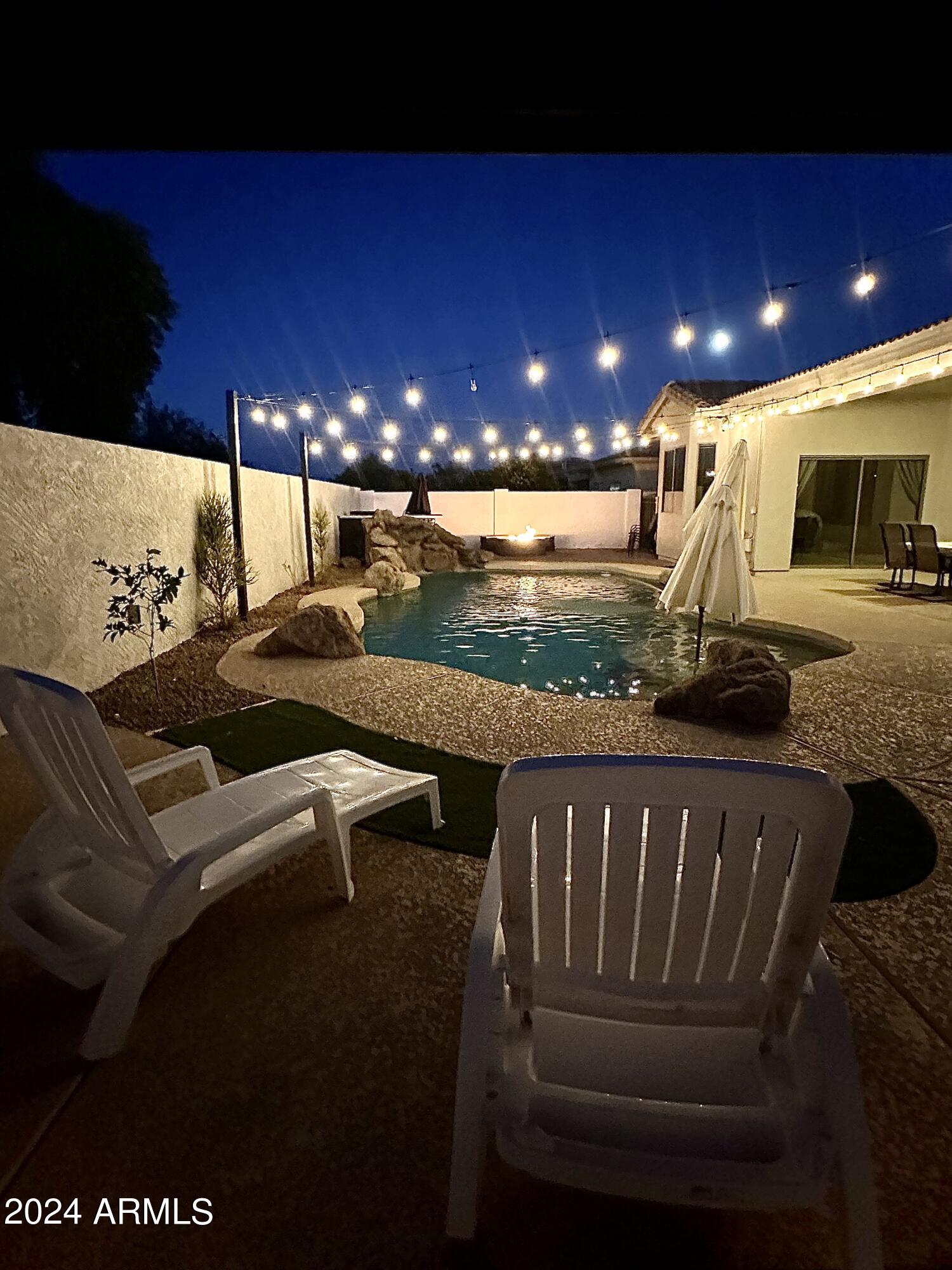 16852 West Northampton Road Surprise, AZ 85374 - Photo 25 of 31 Backyard Evening