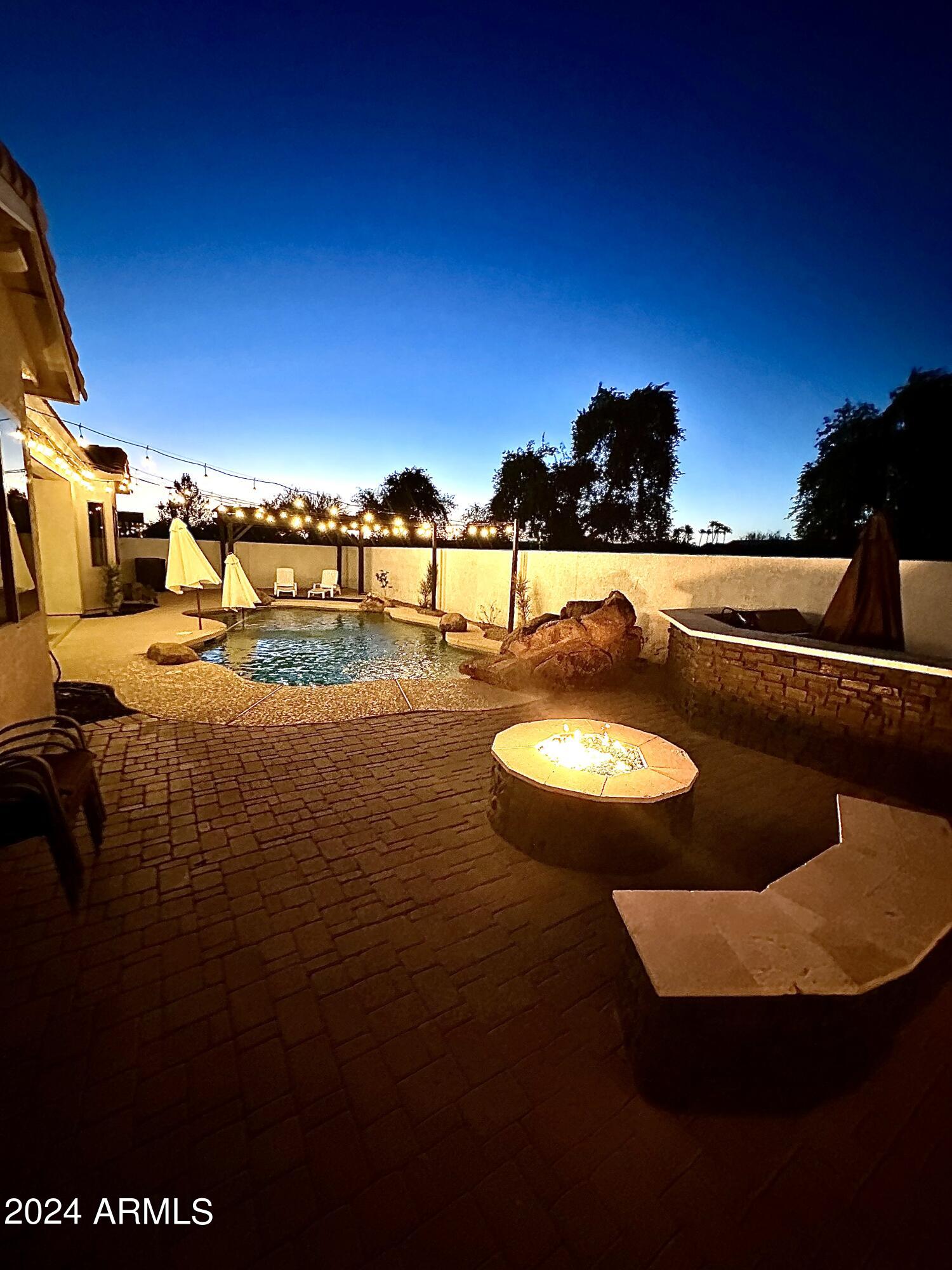 16852 West Northampton Road Surprise, AZ 85374 - Photo 26 of 31 Backyard evening