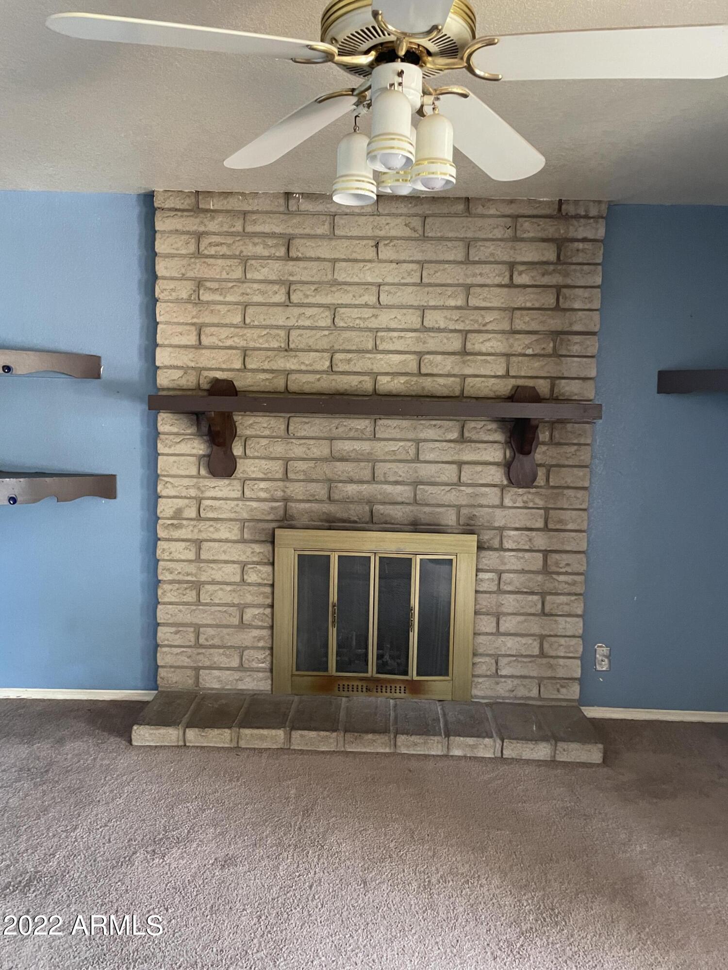 1845 West Utopia Road Phoenix, AZ 85027 - Photo 12 of 33 Fireplace