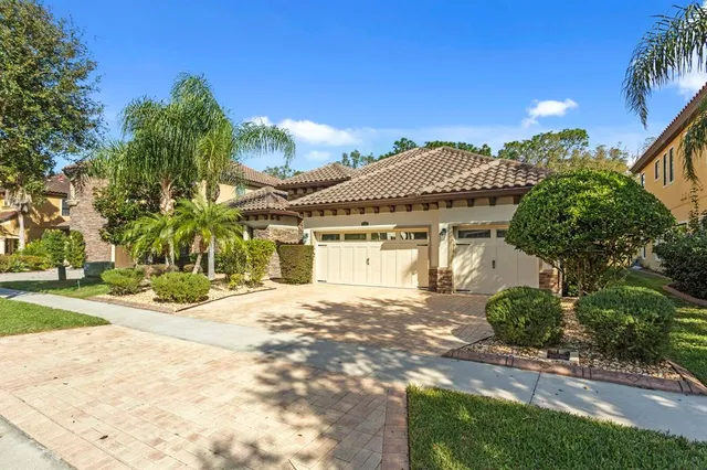 a hallway with a outdoor seating and a potted plant