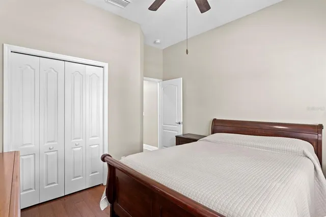 a kitchen with stainless steel appliances granite countertop a refrigerator and a stove