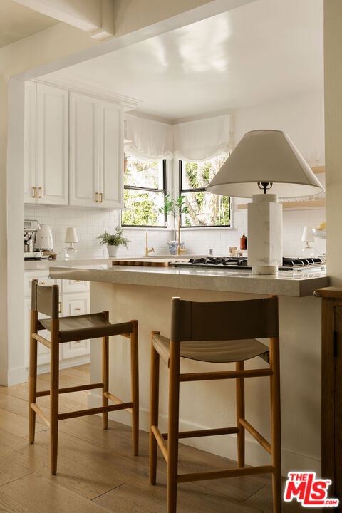 4080 Alla Road Los Angeles, CA 90066 - Photo 12 of 57 a kitchen with a sink cabinets and window