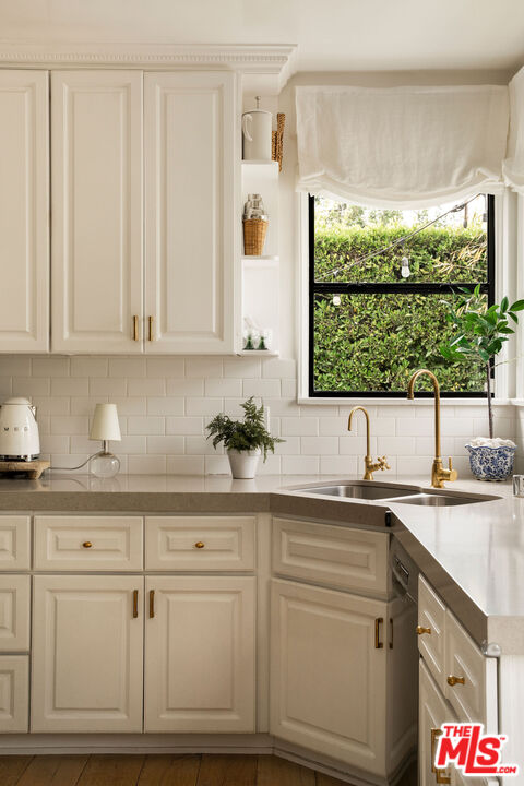 4080 Alla Road Los Angeles, CA 90066 - Photo 14 of 57 a kitchen with white cabinets and white appliances
