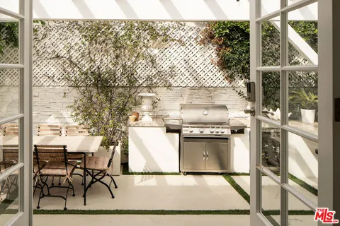 a kitchen with a stove and a microwave