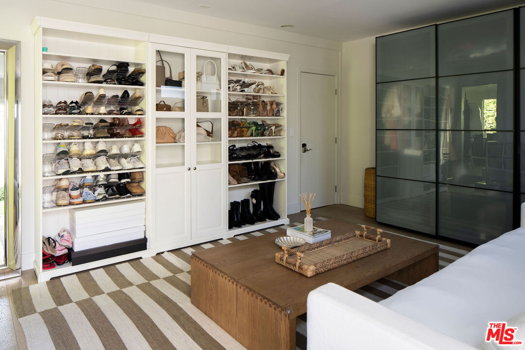4080 Alla Road Los Angeles, CA 90066 - Photo 49 of 57 a living room with a bed and a book shelf