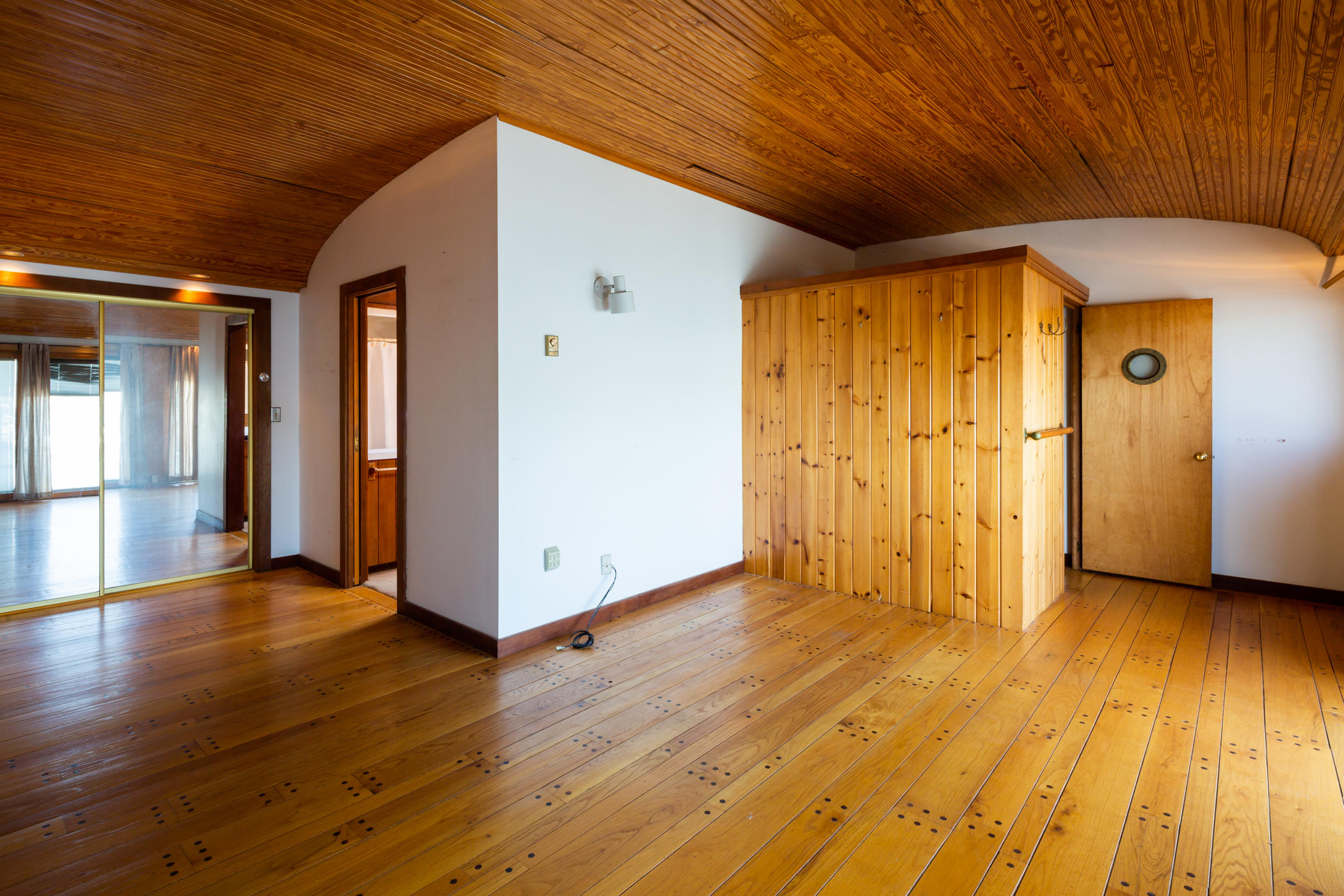 54 Channel Point Road Hyannis, MA 02601 - Photo 11 of 18 a view of an empty room with wooden floor