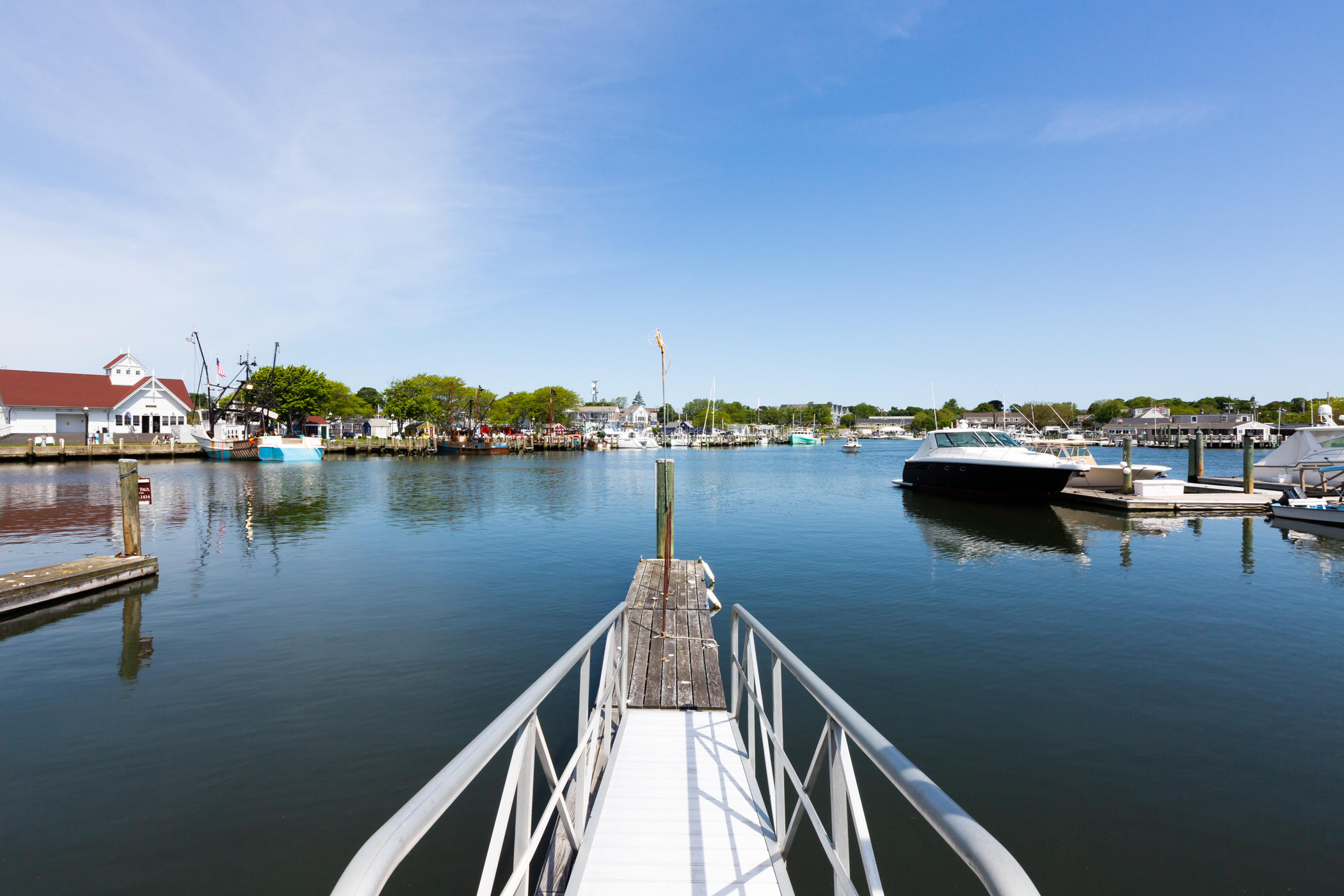 54 Channel Point Road Hyannis, MA 02601 - Photo 3 of 18 a view of a lake from a balcony