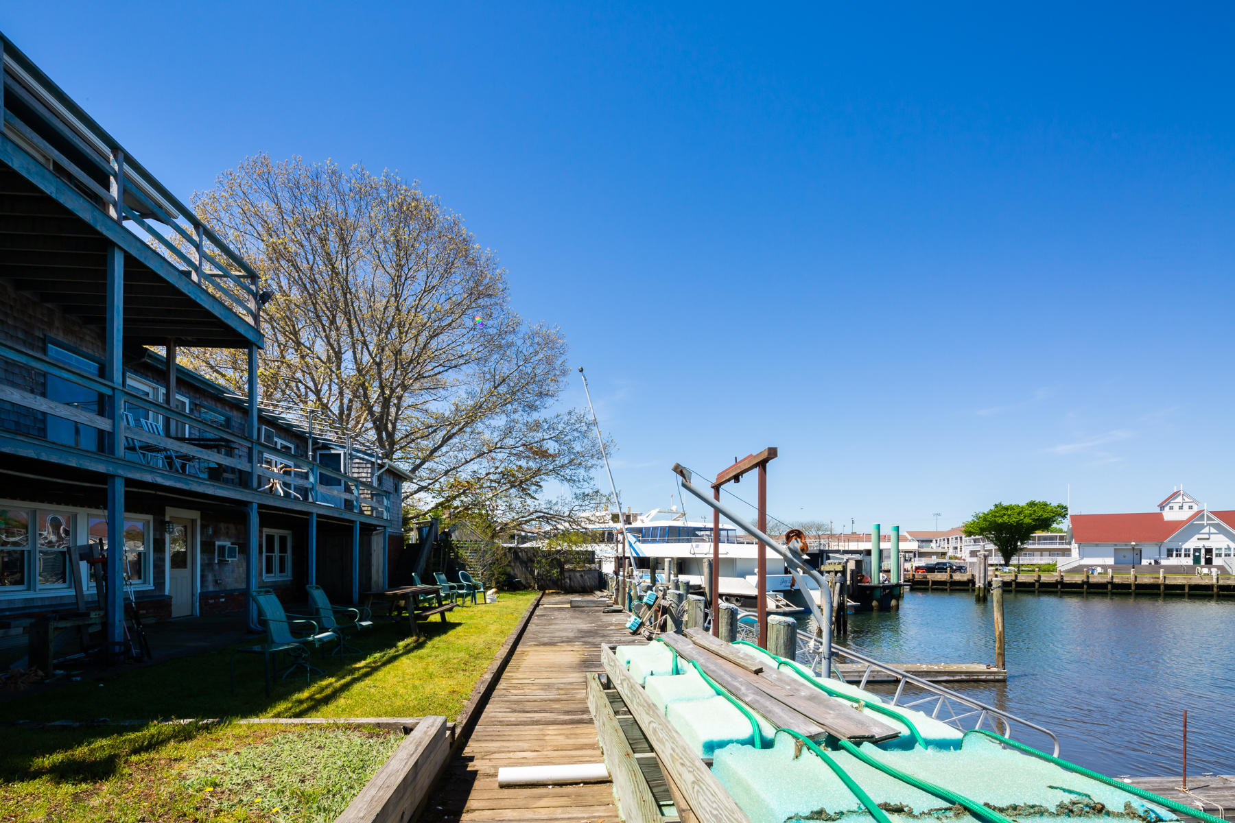 54 Channel Point Road Hyannis, MA 02601 - Photo 4 of 18 a view of a swimming pool with a patio
