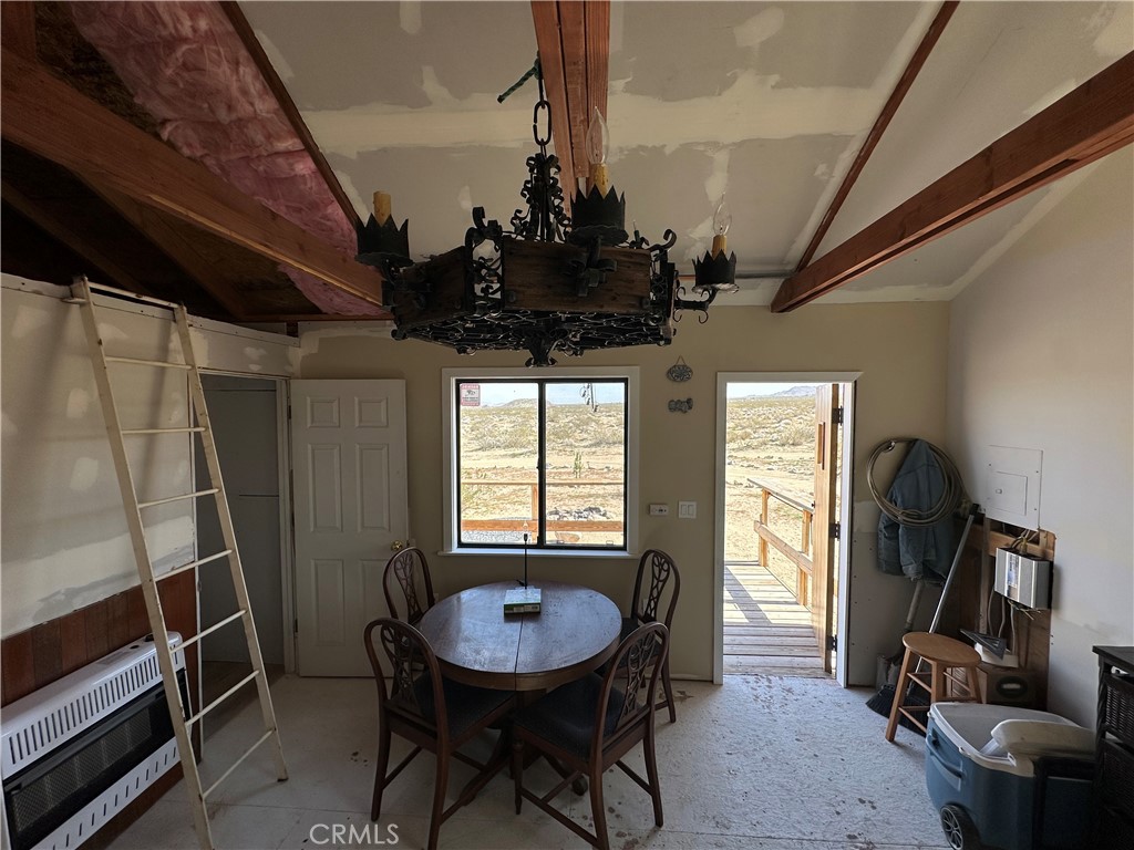 777 Walker Road Johnson Valley, CA 92285 - Photo 12 of 21 a view of a room with furniture and window