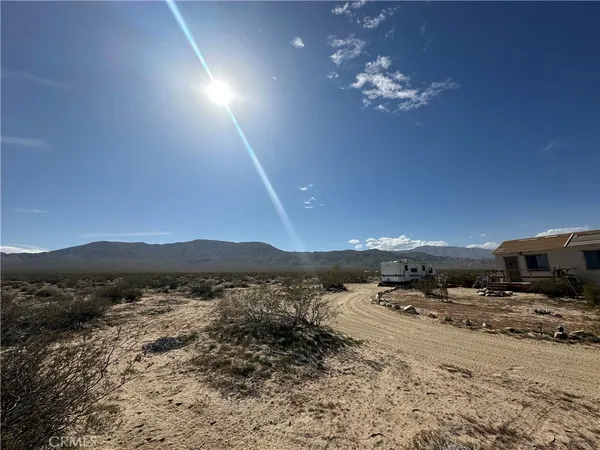 a view of a room with a fireplace
