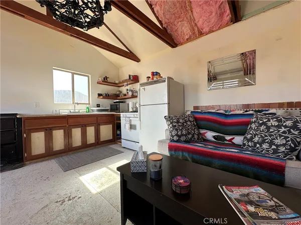 a room with furniture and window