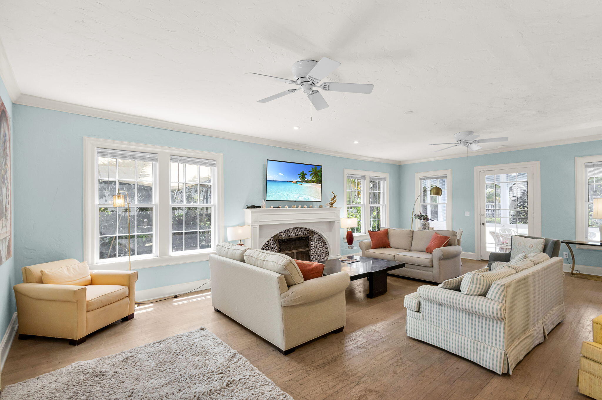 519 28th Street, Unit MAIN HOUSE West Palm Beach, FL 33407 - Photo 12 of 67 a living room with furniture and a fireplace