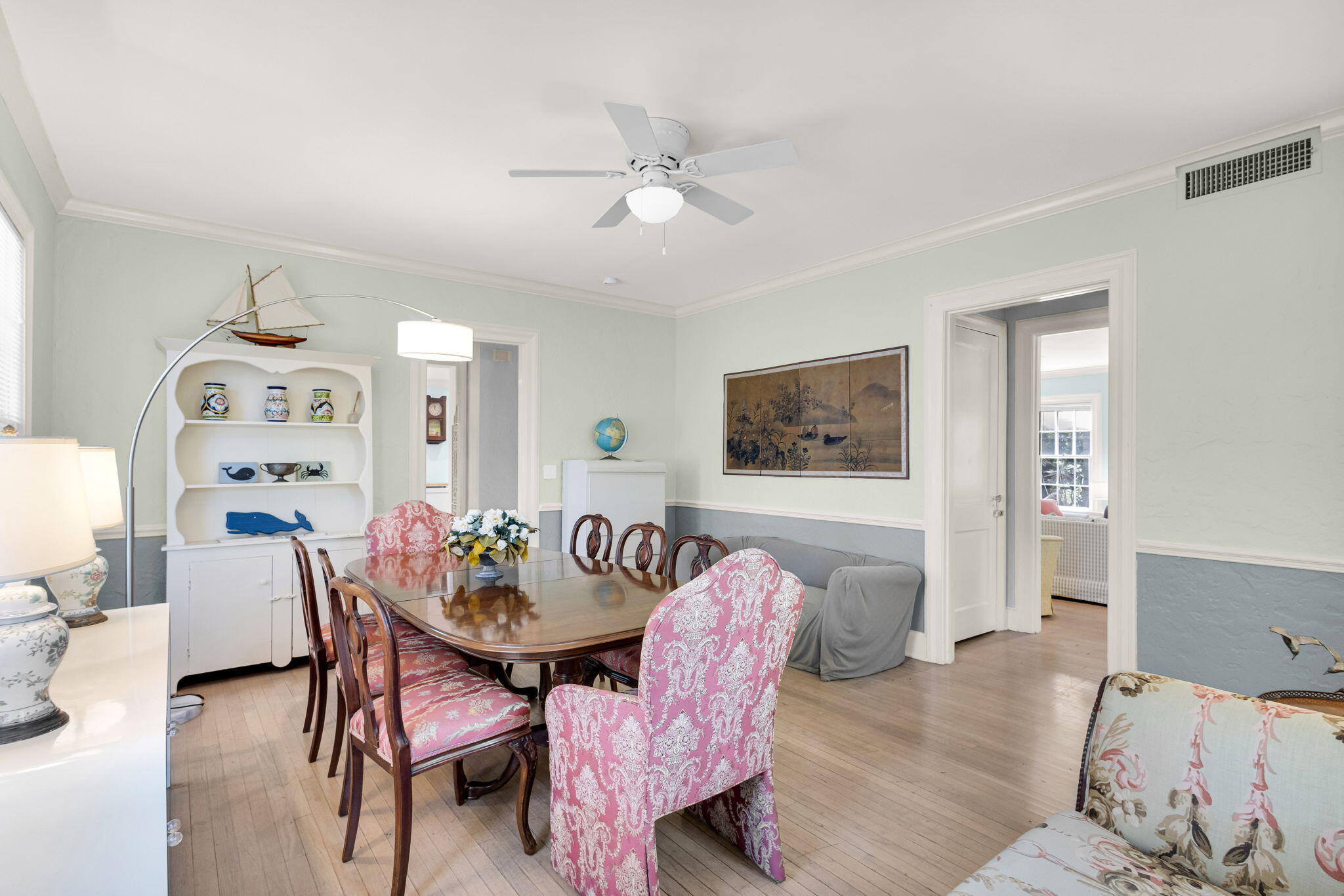 519 28th Street, Unit MAIN HOUSE West Palm Beach, FL 33407 - Photo 18 of 67 a view of a dining room with furniture and wooden floor