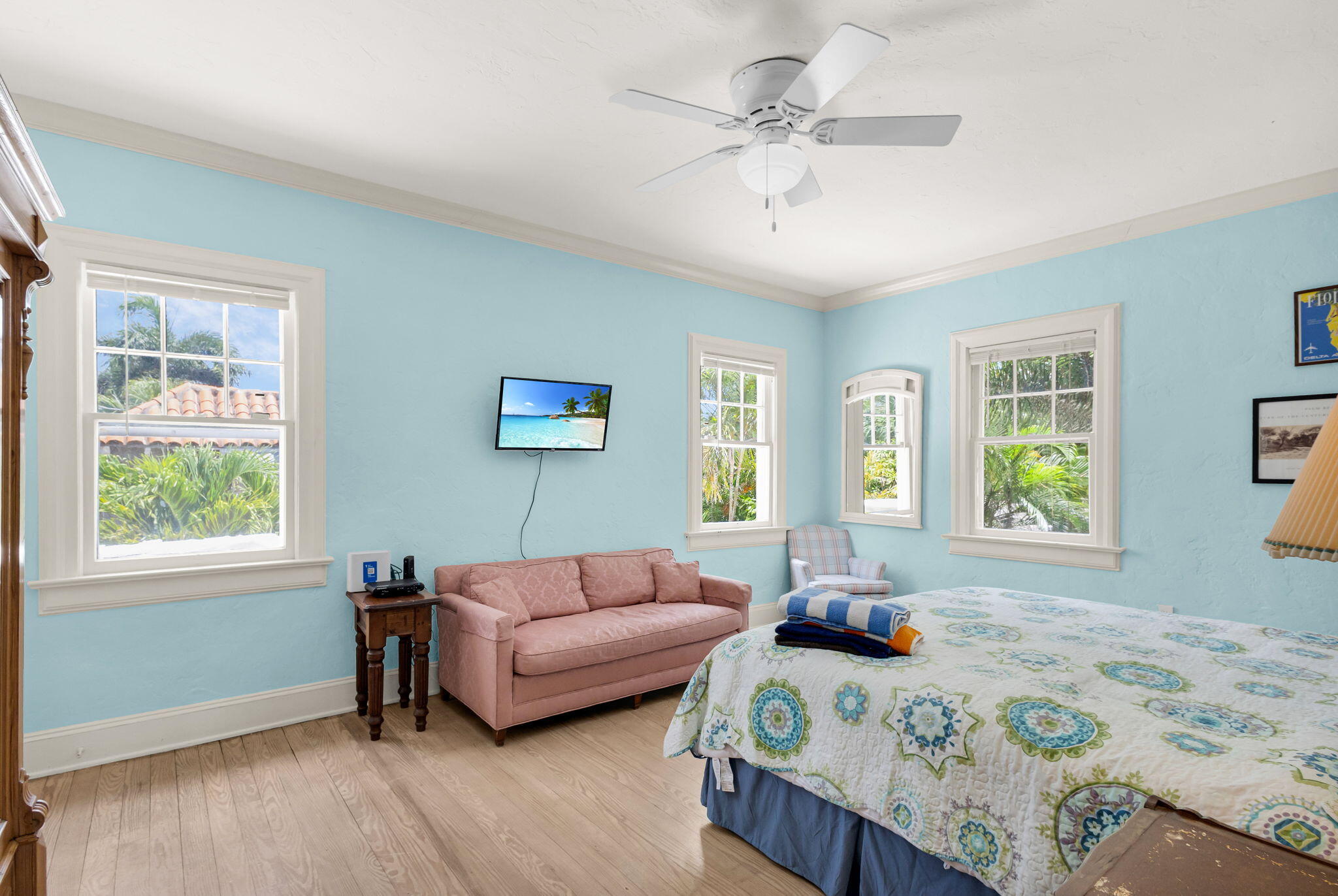 519 28th Street, Unit MAIN HOUSE West Palm Beach, FL 33407 - Photo 43 of 67 a bedroom with a bed couch and window