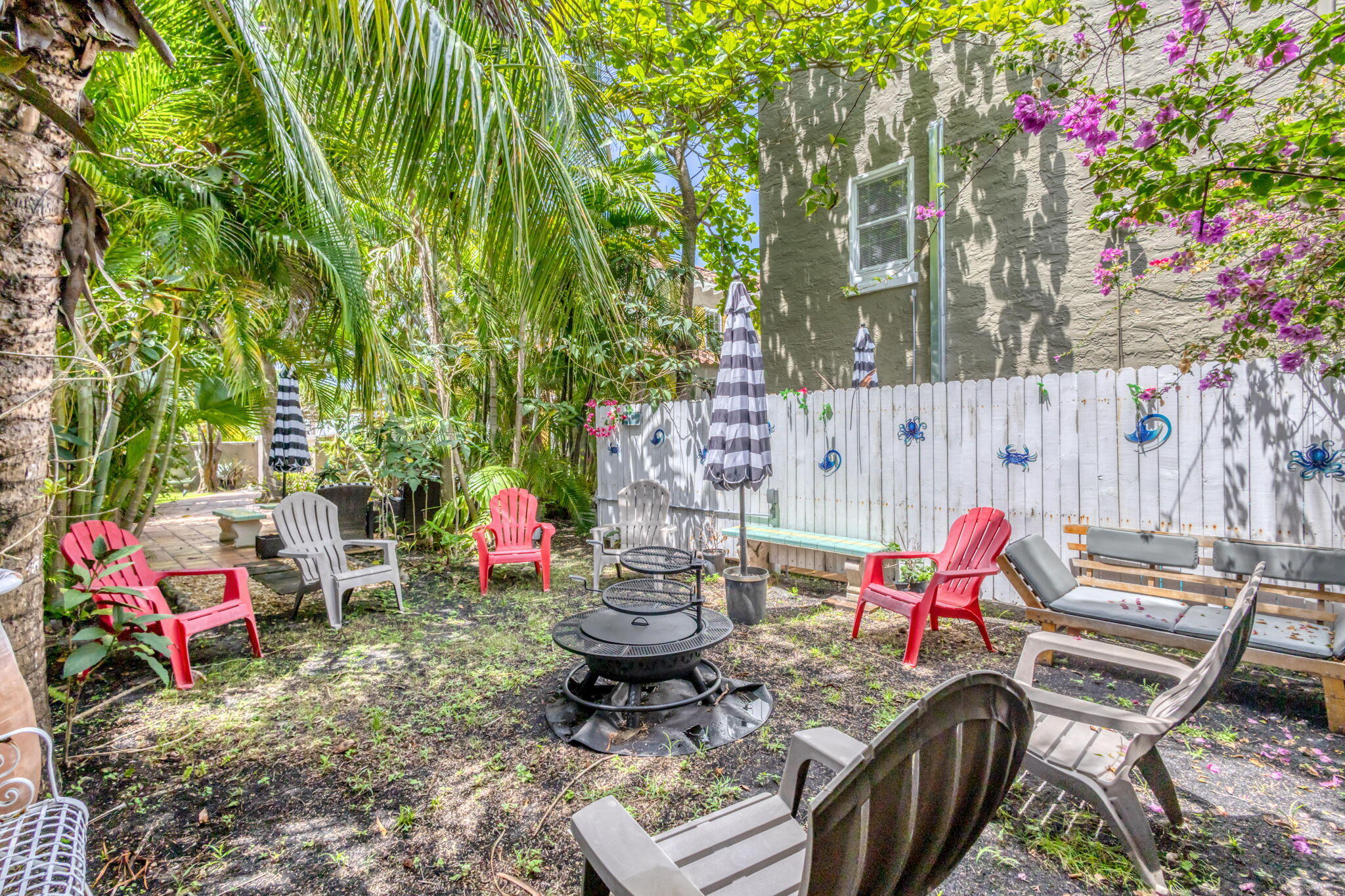 519 28th Street, Unit MAIN HOUSE West Palm Beach, FL 33407 - Photo 63 of 67 a view of a chairs and table in patio