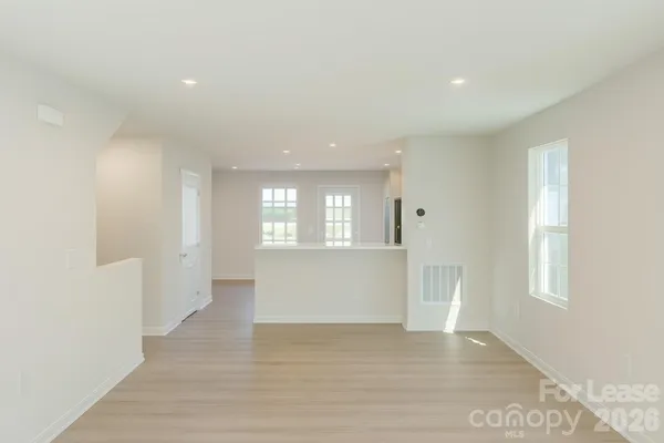 a view of an empty room and window