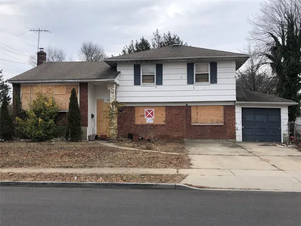 a front view of a house with windows