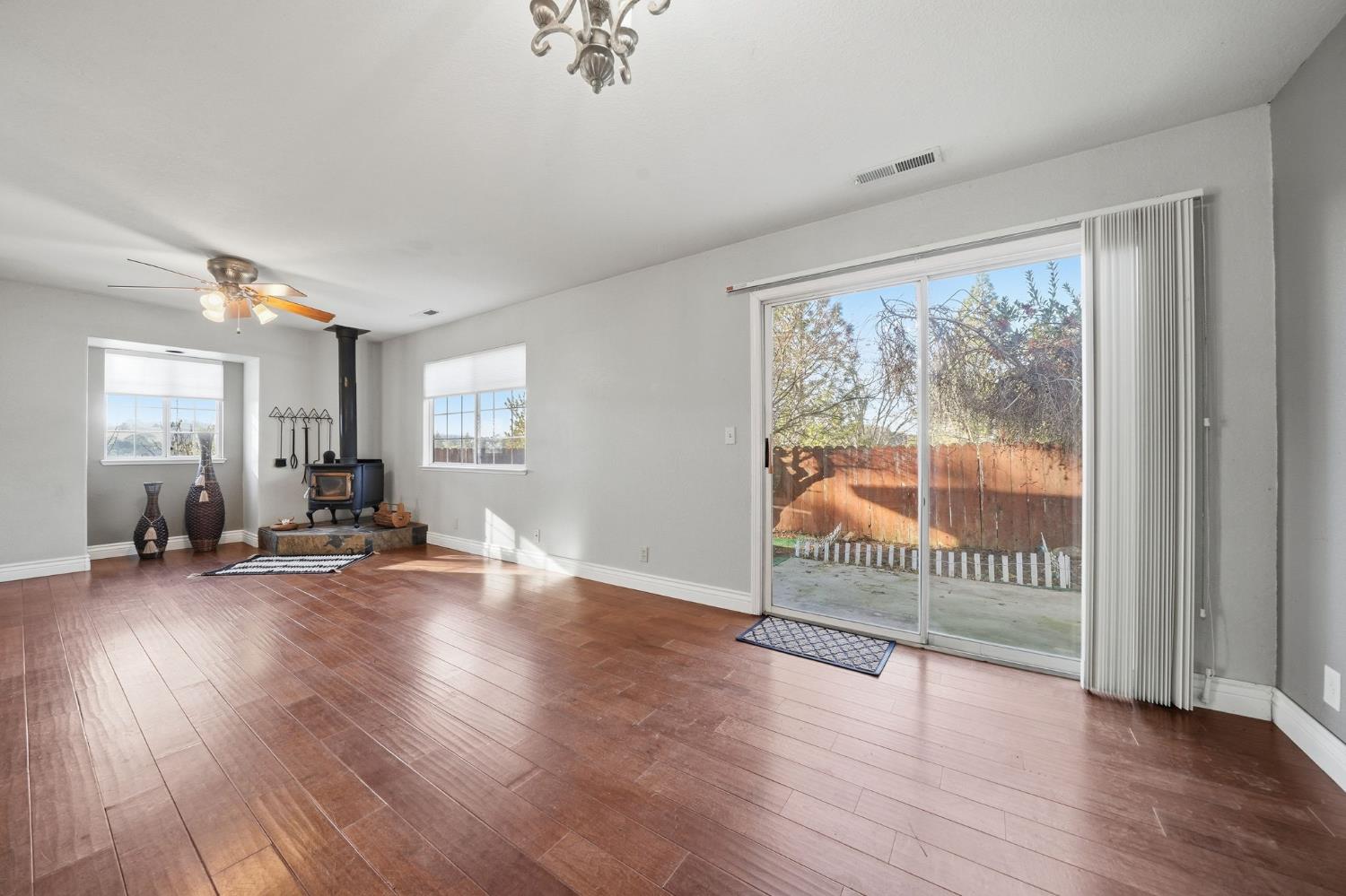101 Terrace View Circle Jackson, CA 95642 - Photo 1 of 28 an empty room with wooden floor and windows