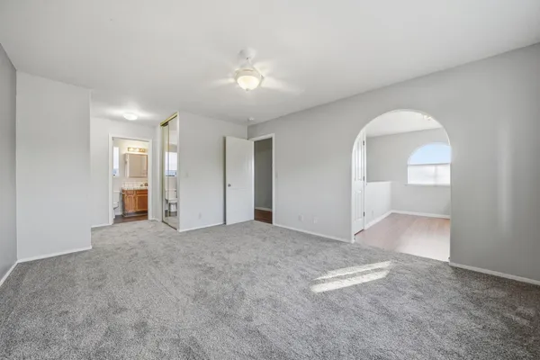 an empty room with a bathroom