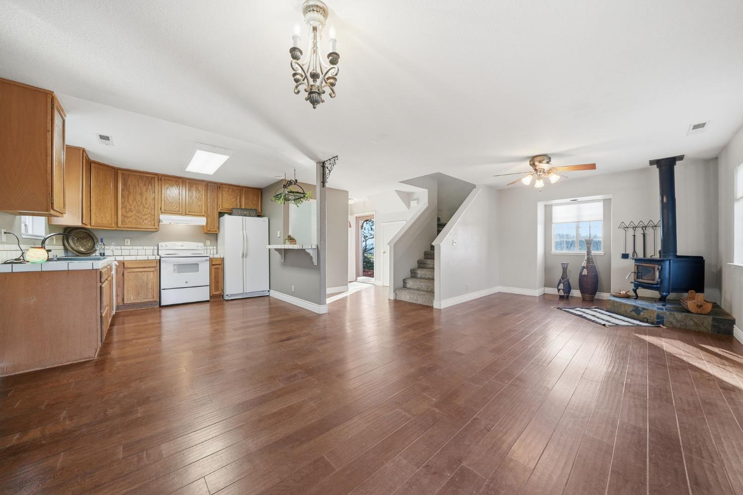 101 Terrace View Circle Jackson, CA 95642 - Photo 2 of 28 a view of a kitchen with furniture and wooden floor