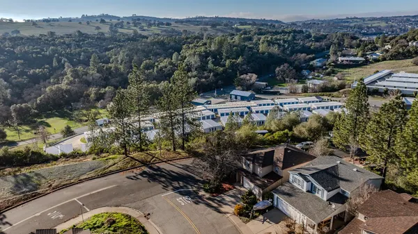 an aerial view of multiple house