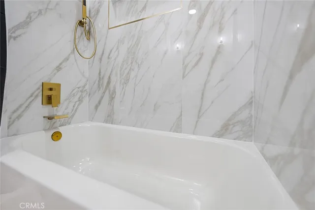 a bathroom with a bathtub