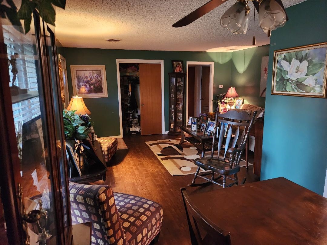 188 Ivan Road Memphis, TN 38109 - Photo 13 of 18 a bedroom with furniture and a chandelier