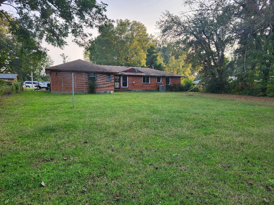 188 Ivan Road Memphis, TN 38109 - Photo 17 of 18 a front view of a house with garden