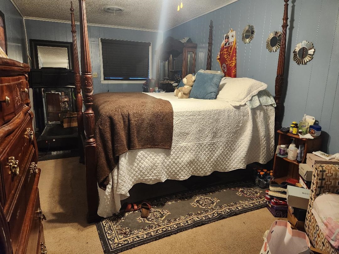 188 Ivan Road Memphis, TN 38109 - Photo 2 of 18 a bedroom with a bed and a window