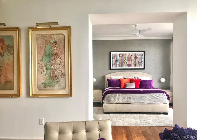 a view of a bedroom with a bed