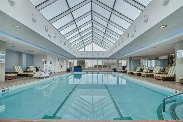 a large room with lots of tables and chairs