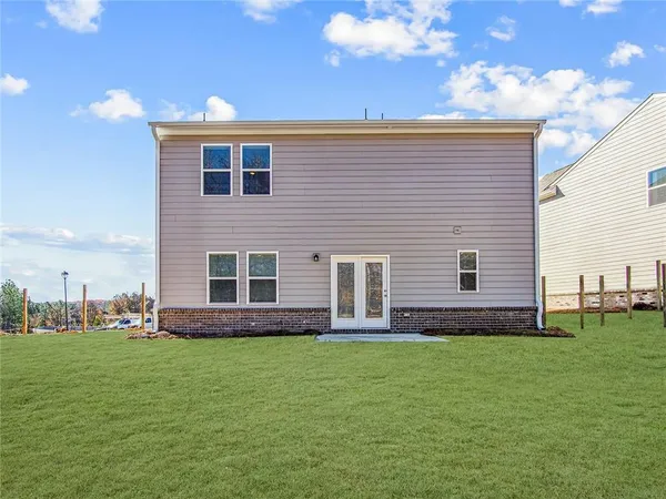 a front view of house with yard