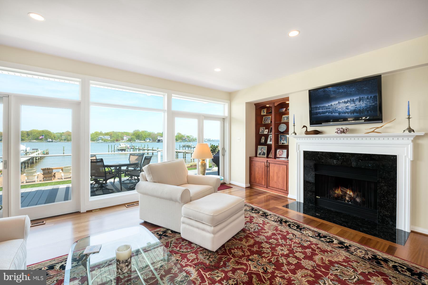 3745 Thomas Point Road Annapolis, MD 21403 - Photo 15 of 26 The great room has a gas fireplace and built-ins