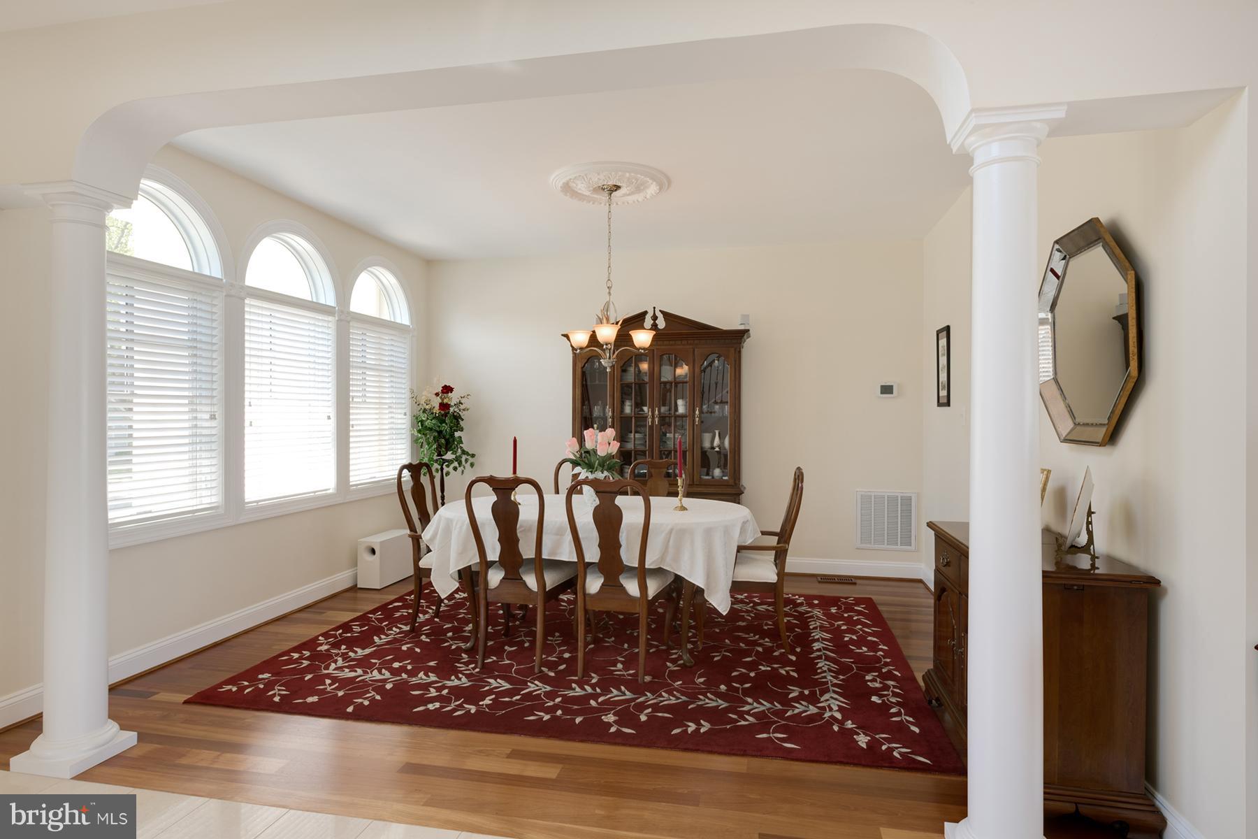 3745 Thomas Point Road Annapolis, MD 21403 - Photo 8 of 26 The formal dining room has cherry floors