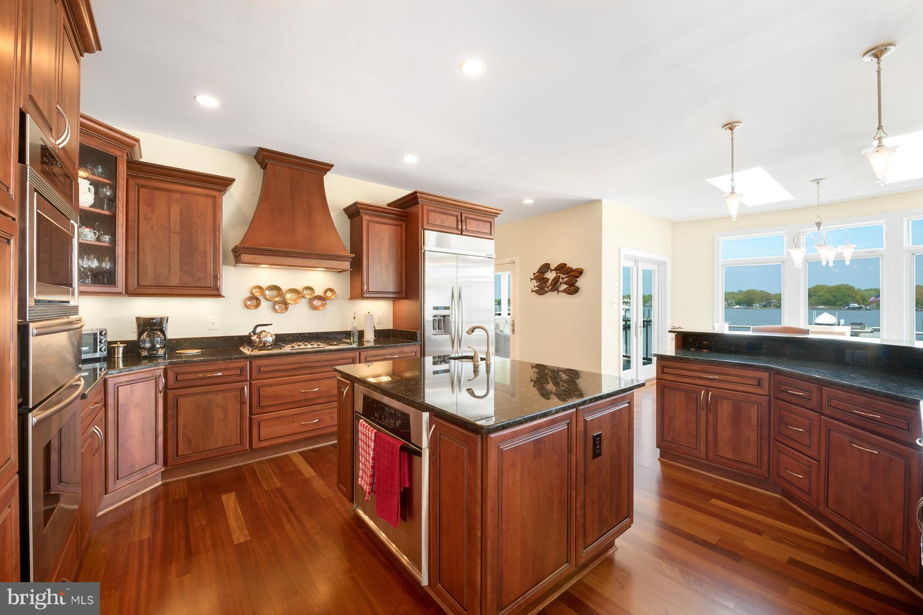 3745 Thomas Point Road Annapolis, MD 21403 - Photo 9 of 26 Kitchen has a center island with prep sink