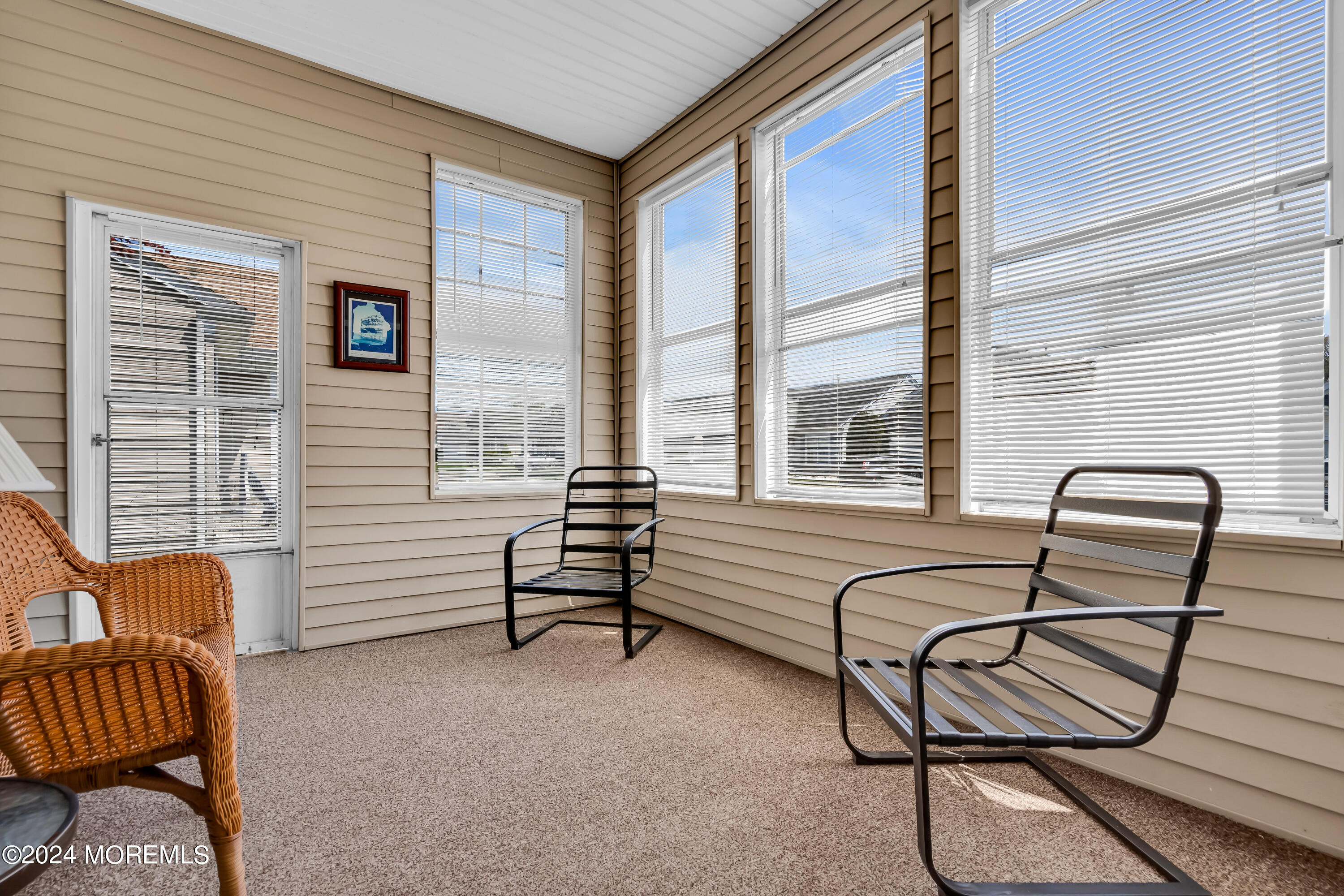 89 Quail Road Barnegat, NJ 08005 - Photo 33 of 37 a balcony with couple of chairs and a couch