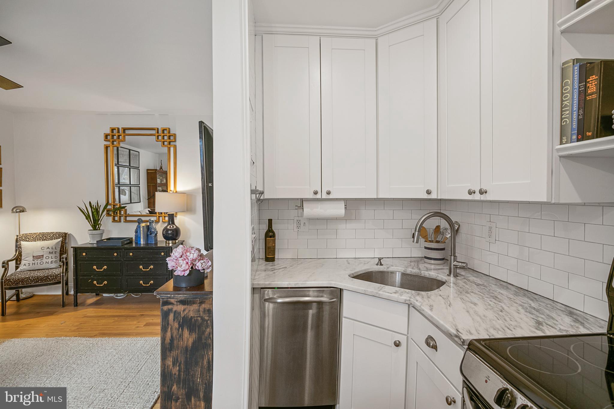 4029 Benton Street Northwest, Unit 101 Washington, DC 20007 - Photo 7 of 28 Kitchen with Stainless Steel Appliances