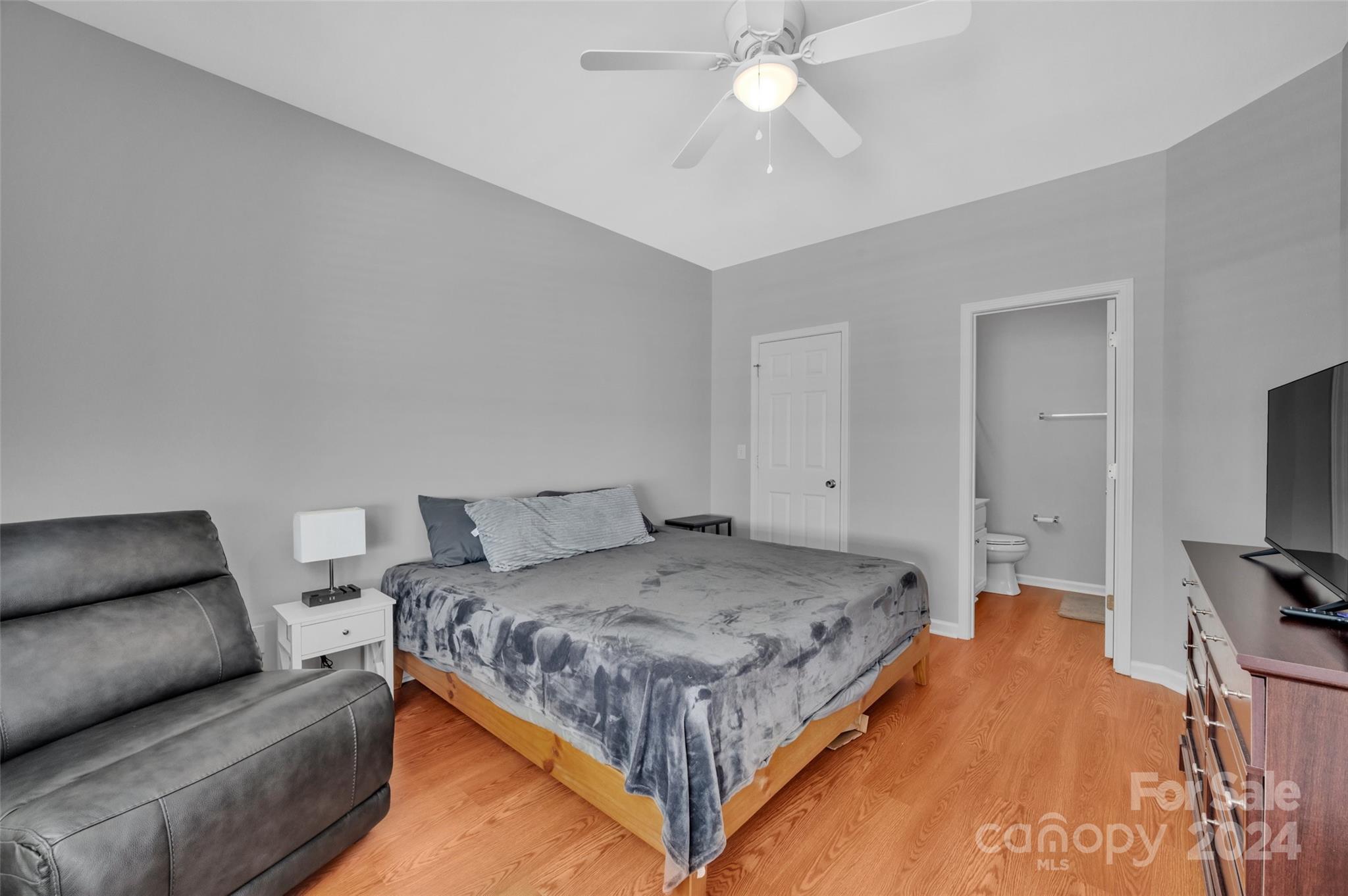 714 Shellstone Place Fort Mill, SC 29708 - Photo 13 of 24 a bedroom with a bed and a flat screen tv
