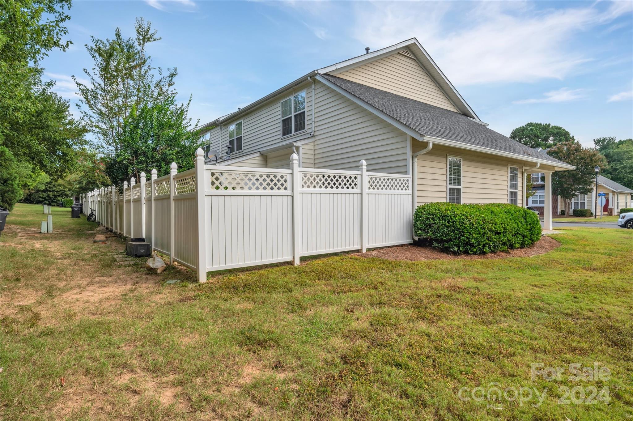 714 Shellstone Place Fort Mill, SC 29708 - Photo 23 of 24 a view of a house with a yard and plants