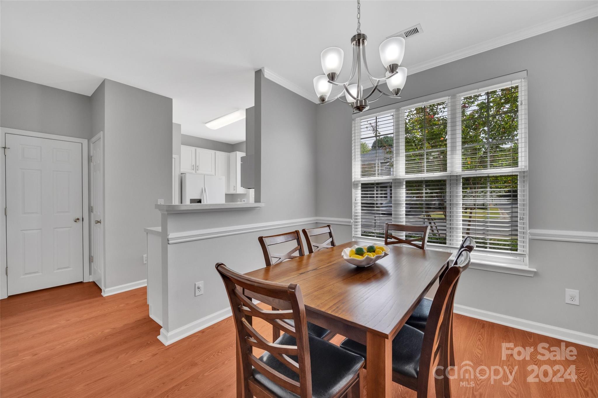 714 Shellstone Place Fort Mill, SC 29708 - Photo 5 of 24 a view of a dining room with furniture and chandelier