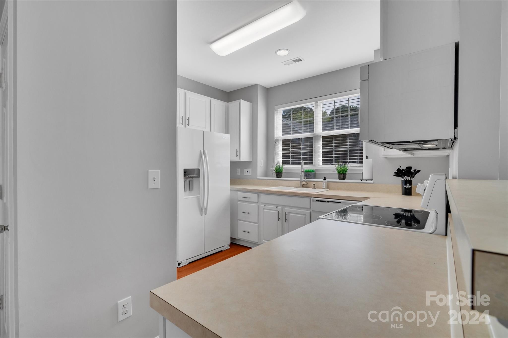 714 Shellstone Place Fort Mill, SC 29708 - Photo 6 of 24 a kitchen with stainless steel appliances a sink stove and refrigerator