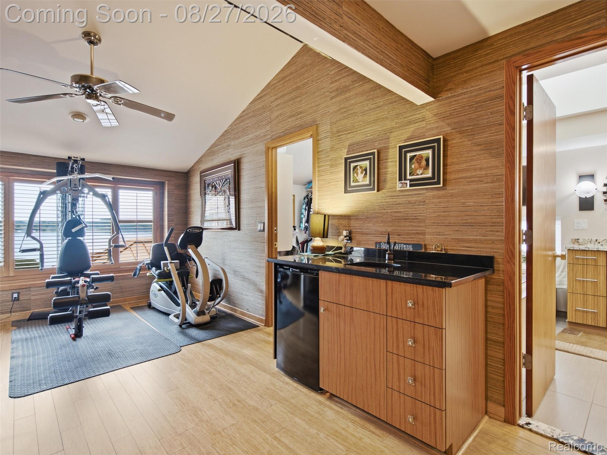 3549 Mann Road Clarkston, MI 48346 - Photo 33 of 63 Versatile Flex Room with Wet Bar, Refrigerator & Hot Water on Demand — Currently Designed as a Private Exercise Studio
