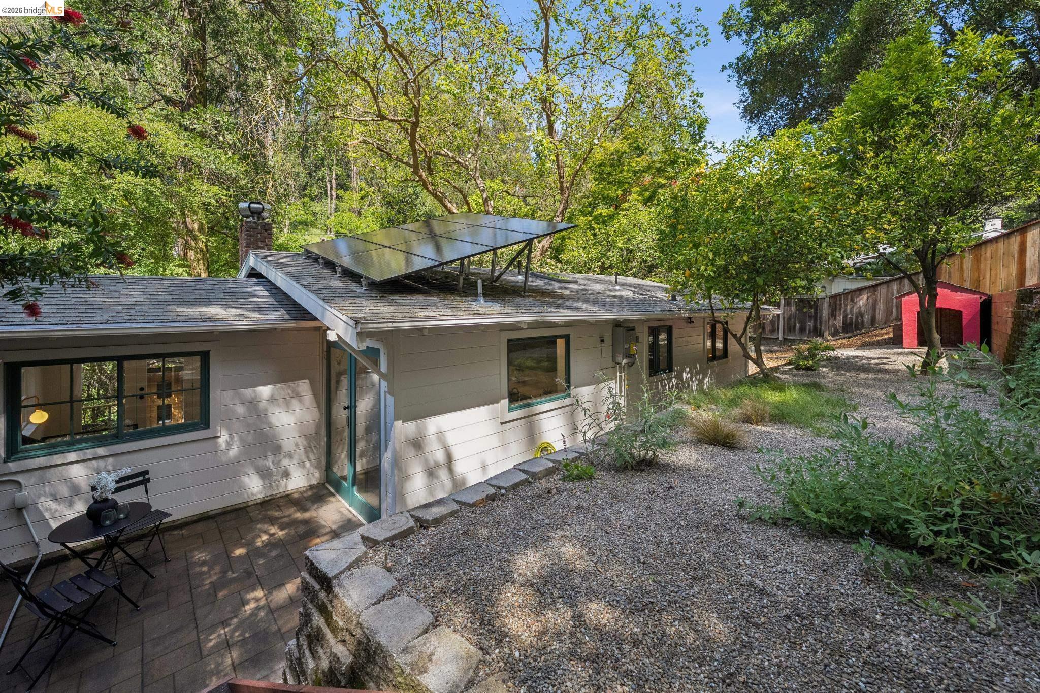 6400 Pinehaven Road Oakland, CA 94611 - Photo 49 of 78 Rear exterior with solar panel array