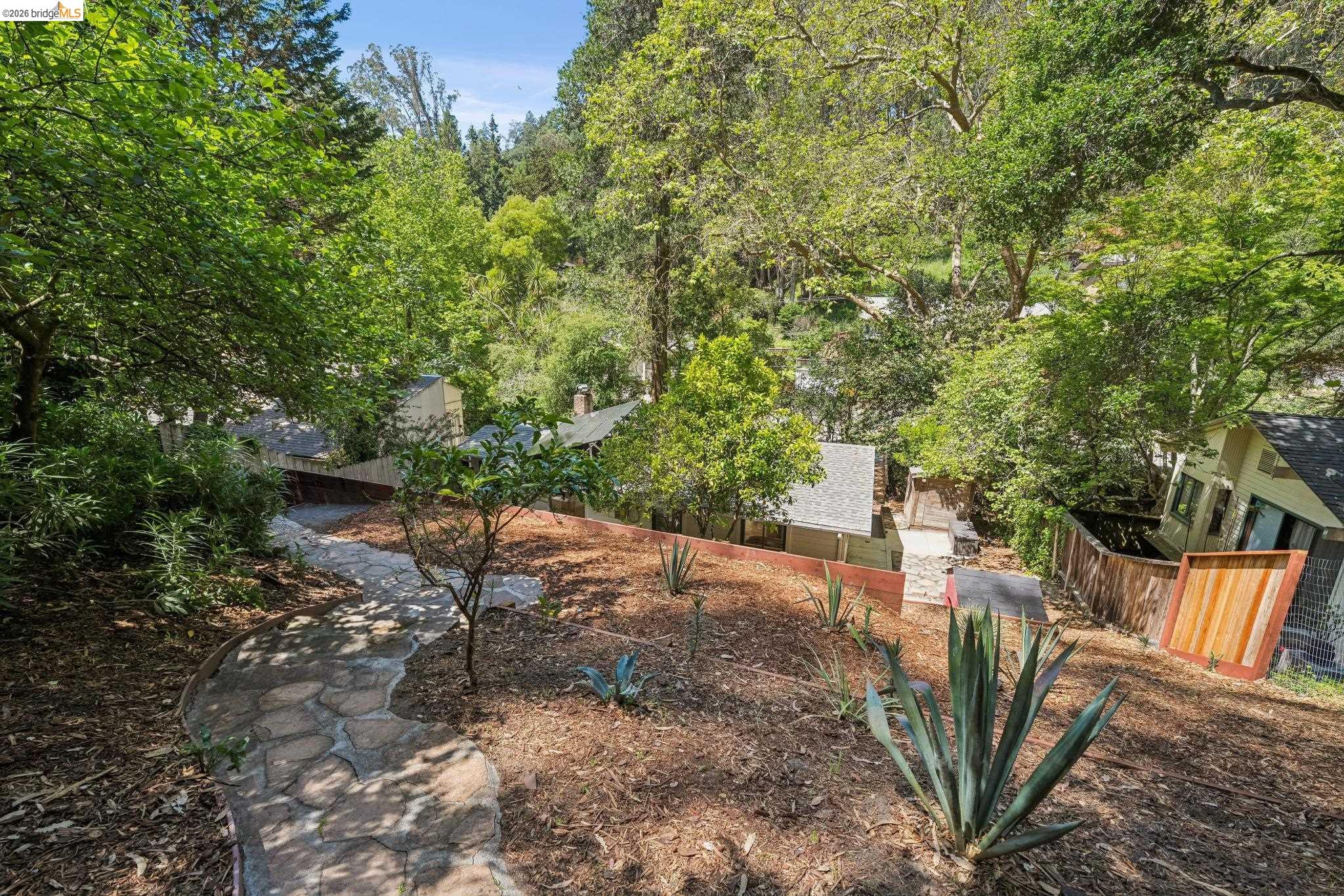6400 Pinehaven Road Oakland, CA 94611 - Photo 51 of 78 Tiered hillside landscaping featuring a stone pathway