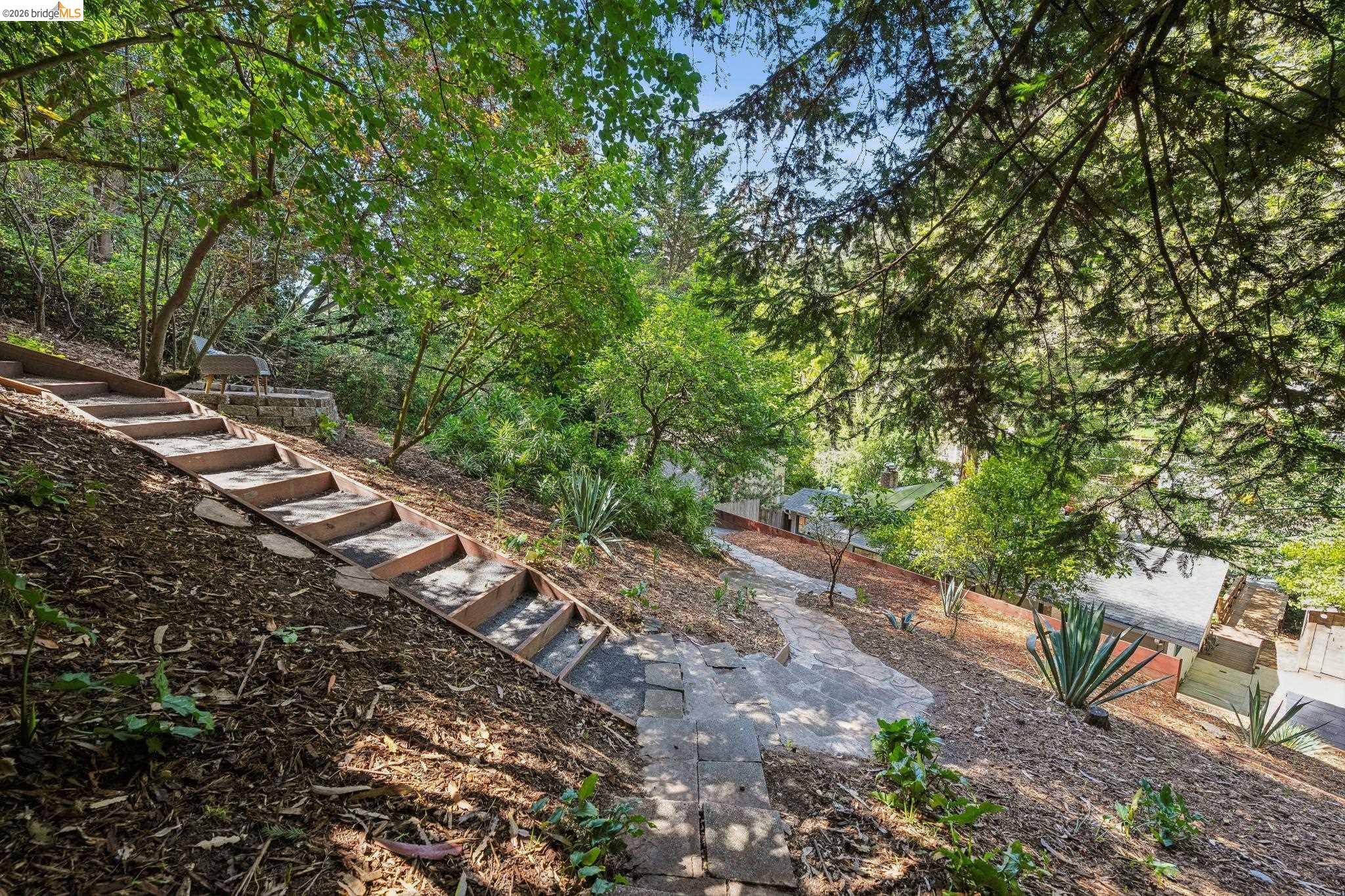 6400 Pinehaven Road Oakland, CA 94611 - Photo 62 of 78 Terraced landscaping featuring stone steps and a paved pathway
