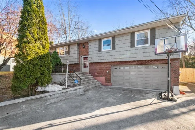 front view of a house with a street