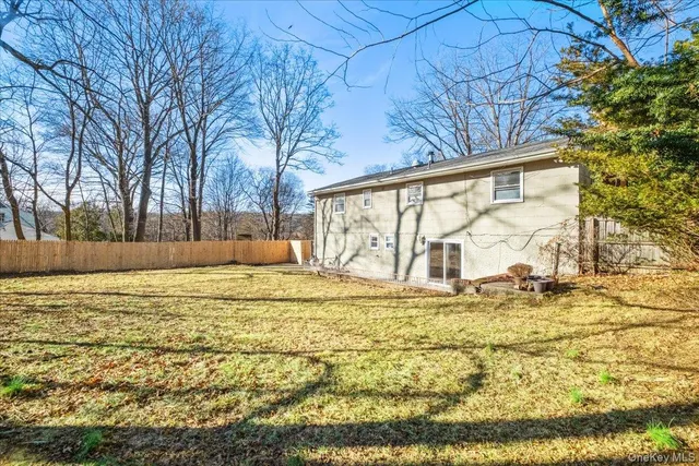 a view of swimming pool with a yard