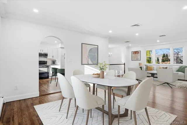 a view of a dining room with furniture